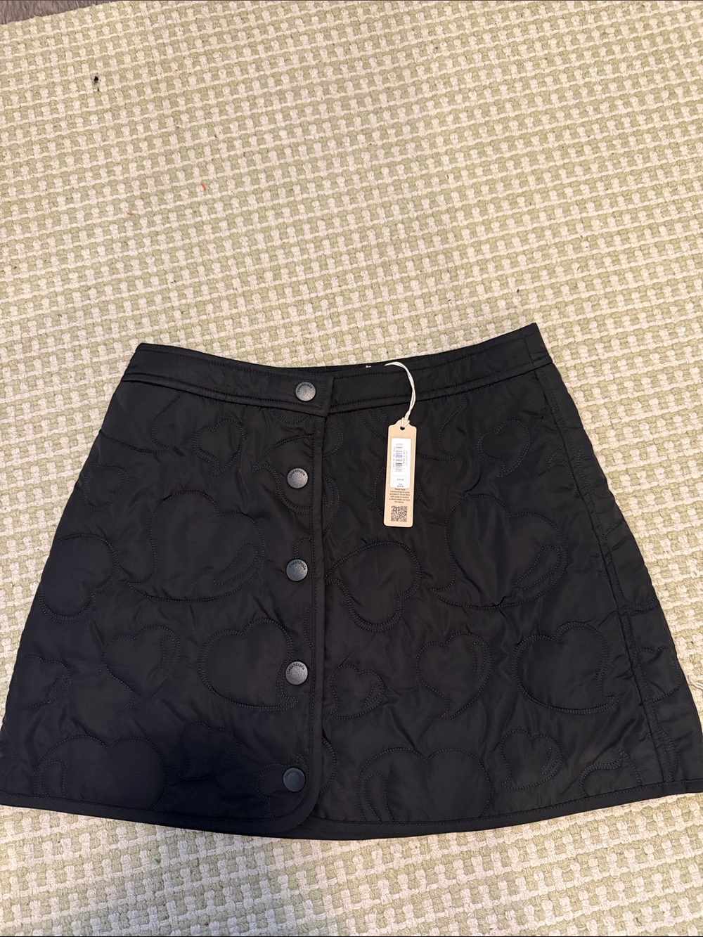 Coach Black Quilted Heart-Pattern Button Mini Skirt